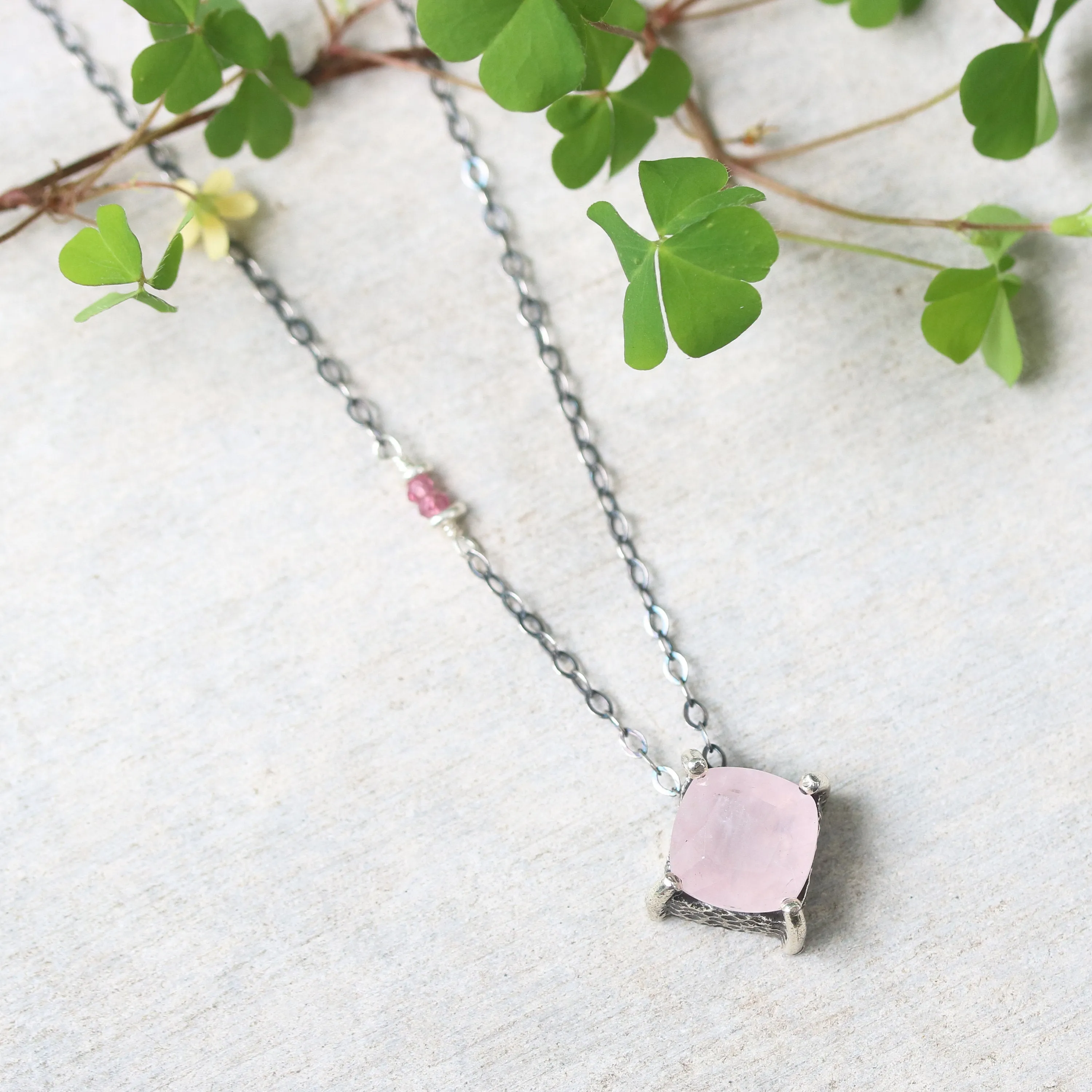Cushion rose quartz necklace in silver bezel and prongs setting with pink multi-sapphire beads secondary on oxidized silver