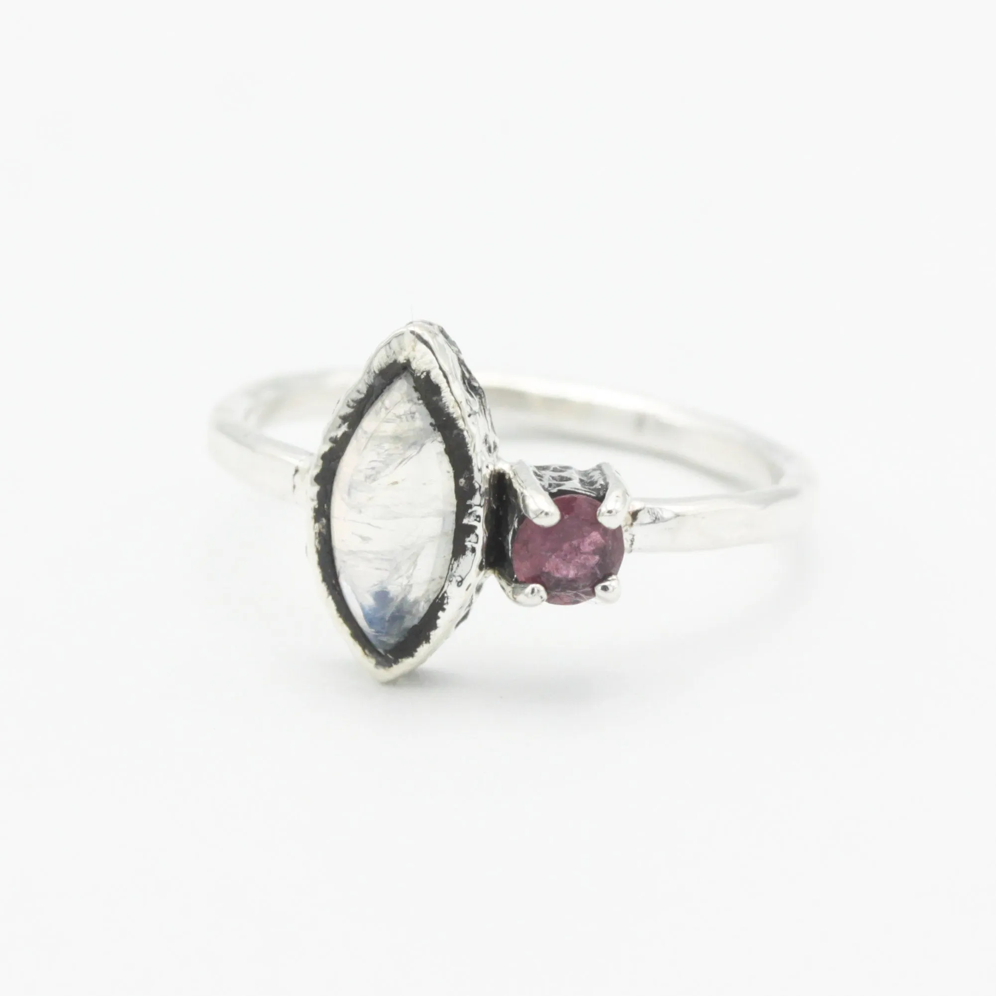 Marquise moonstone ring with pink tourmaline side set gems in bezel and prongs setting