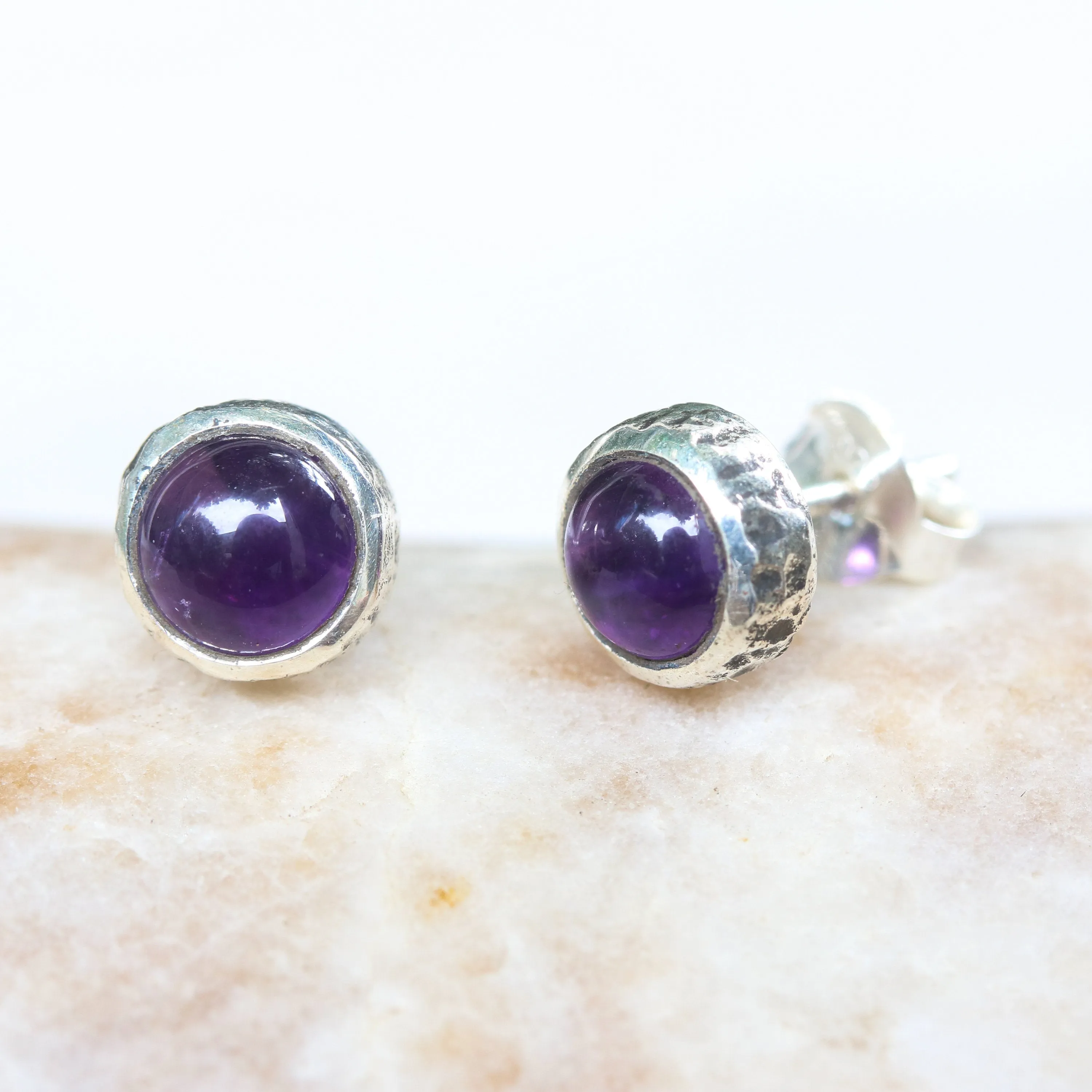 Round cabochon Amethyst earrings in silver bezel setting with sterling silver post and backing