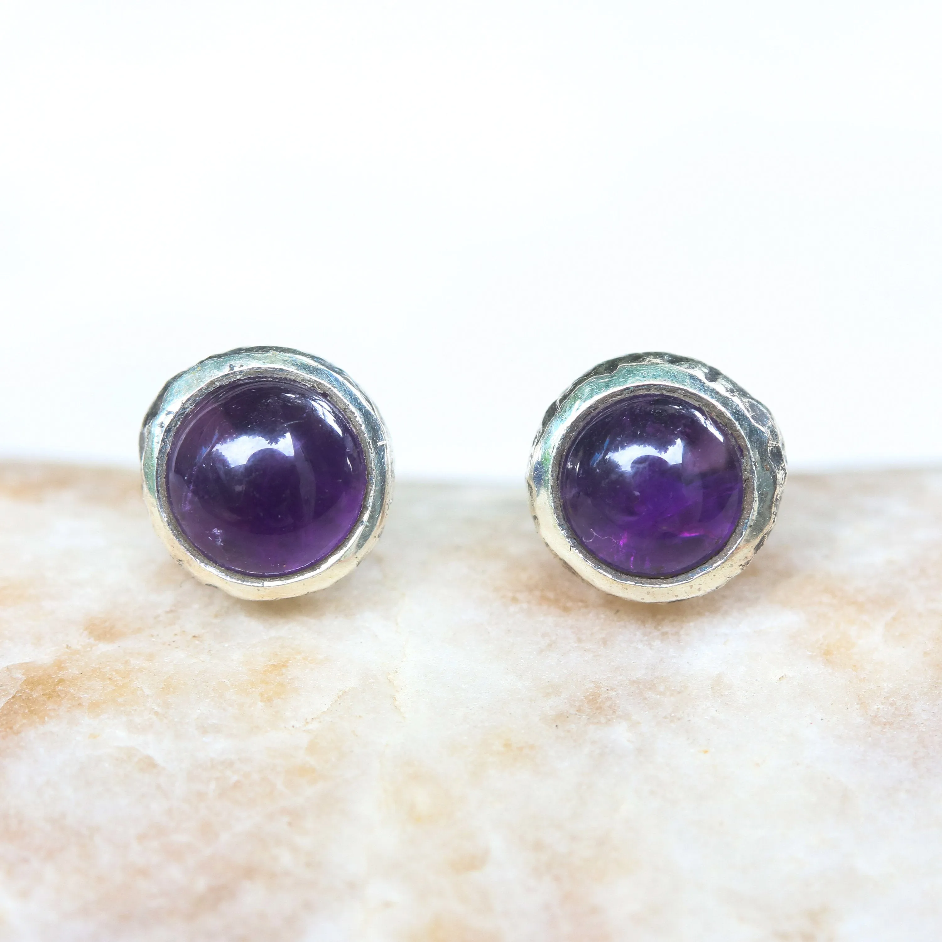 Round cabochon Amethyst earrings in silver bezel setting with sterling silver post and backing