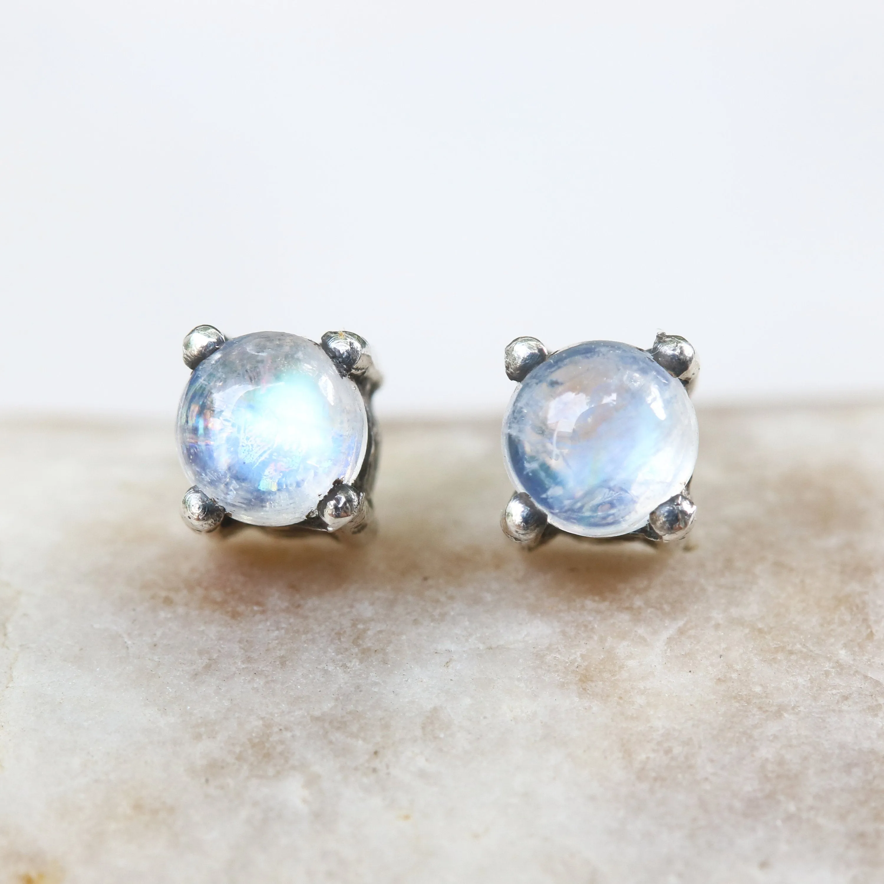 Sterling silver stud earrings with cabochon moonstone in prongs setting with sterling silver post and backing